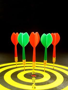 dartboard darts arrows in the target 