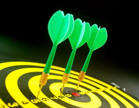 dartboard darts arrows in the target 