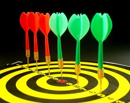 dartboard darts arrows in the target 