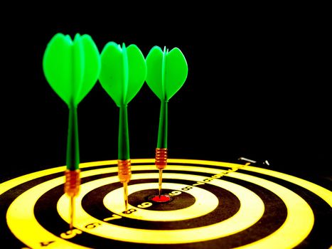 dartboard darts arrows in the target 