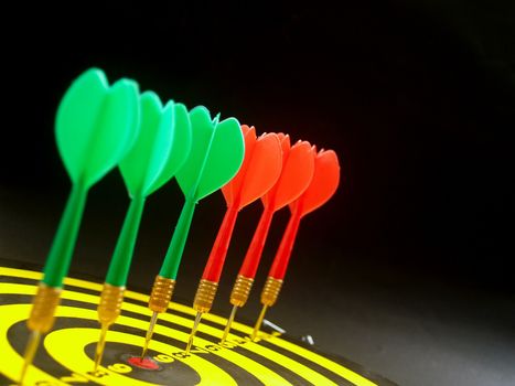dartboard darts arrows in the target 