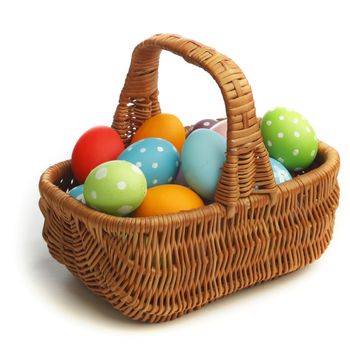 Basket with eater eggs isolated on white background