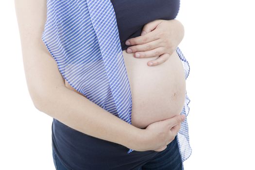 Closeup of pregnant woman at white background