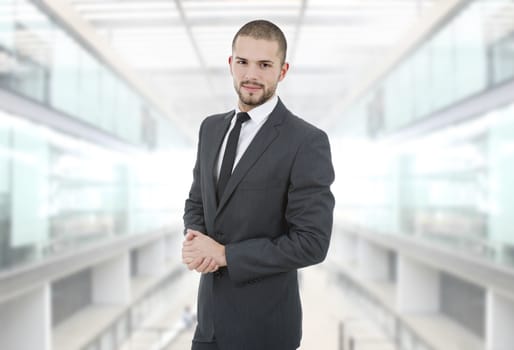 young happy business man at the office