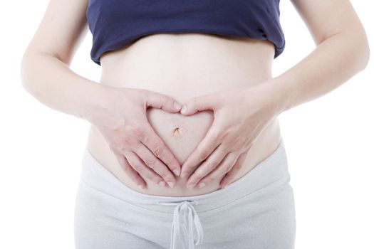 Closeup of pregnant woman at white background