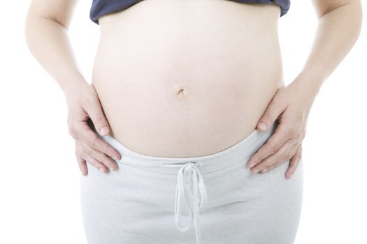 Closeup of pregnant woman at white background