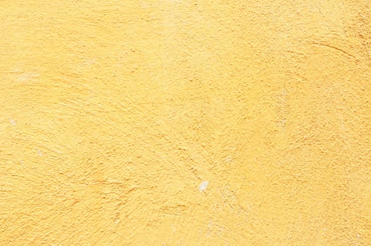 Retro yellow concrete wall background 