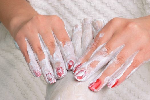 pedicure. feet massage with moisturizing or peeling cream.