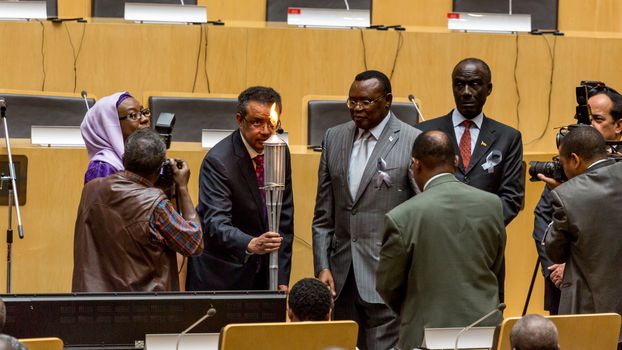 Addis Ababa, Ethiopia - April, 2014: Dr. Tedros, Adhanom, and Ambassador Nsengimana light the "flame of remembrance" which symbolizes memory, hope and preventing genocide, on 11 April, 2014, in Addis Ababa, Ethiopia