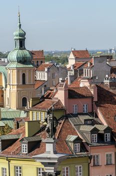 Zygmunt III Vasa, houses and church in the Old Town of Warsaw,Poland.