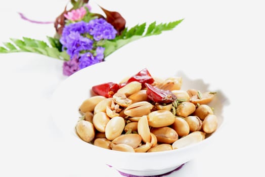 Chinese Food: Toasted peanut kernels on a white background