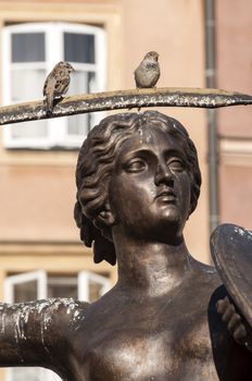 Mermaid statue in the Old Town Square of Warsaw, Poland.