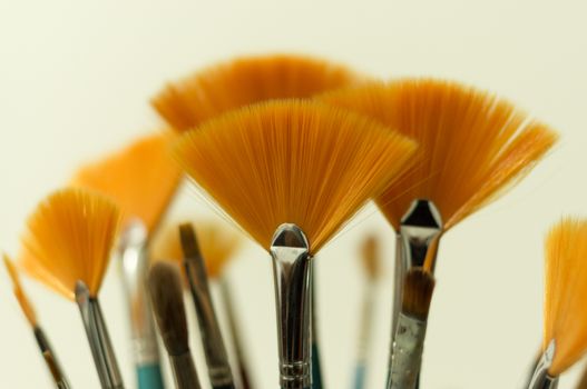 Detail of a few brushes used in a painting workshop