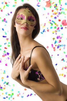 cute young brunette wearing bra lingerie with face behind golden mask