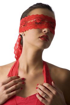 nice portrait of cute and sexy brunette in red shirt and a red lace mask