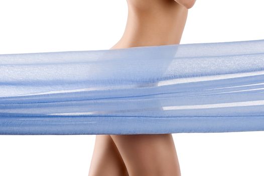 close up on a naked woman body behind a transparent blue colored material beauty wellness concept