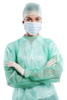 pretty nurse wearing a surgery dress with cap mask and gloves isolated over white