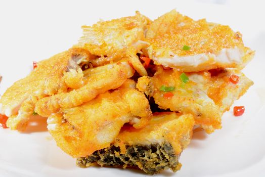 Chinese Food: Fried fish fillets in a white plate