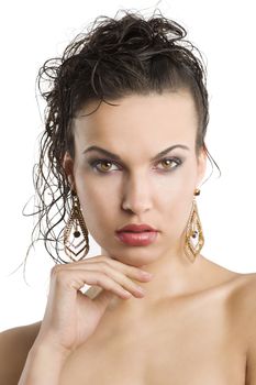 young beautiful brunette woman with hair style and nice jewellery looking in camera