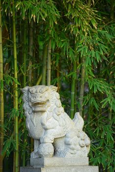 chinese garden with stone lion