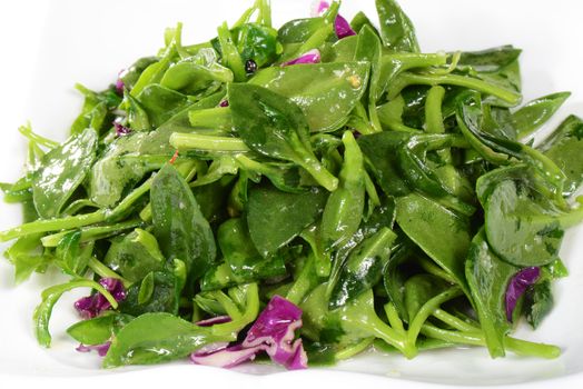 Chinese Food:  Fried wild vegetables on a white background