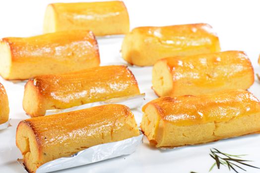 Chinese Food: Toasted sweet potato rolls on a white background