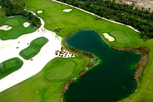 Flying above a golf course at an exotic destination