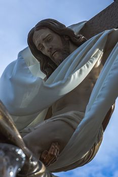 Linares, Jaen province, SPAIN -  April 6, 2012: Brotherhood of the Holy Christ of the descent, work of the Spanish sculptor Victor de los Rios, Linares, Jaen province, Andalusia, Spain