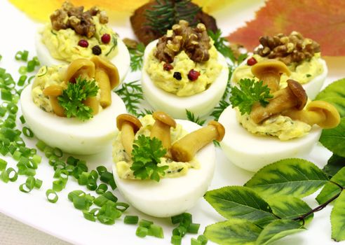 Eggs stuffed with boiled egg yolk, fried onions and mushrooms