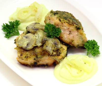 Salmon roasts with fried mushrooms and potato puree