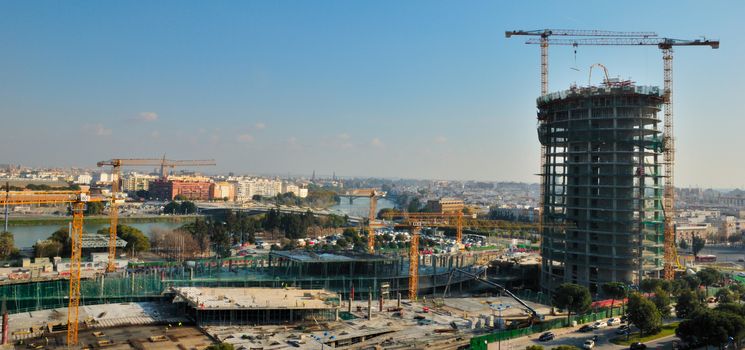 The Tower is an office skyscraper under construction in Seville, Spain, that is being built under the masterplan of Puerto Triana. The tower is designed by Argentine architect Cesar Pelli.