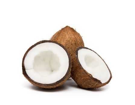 coconut cut in half on white background