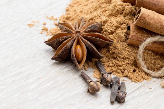 Cloves, anise and cinnamon isolated on white background