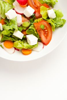 vegetable salad close up in a white bowl