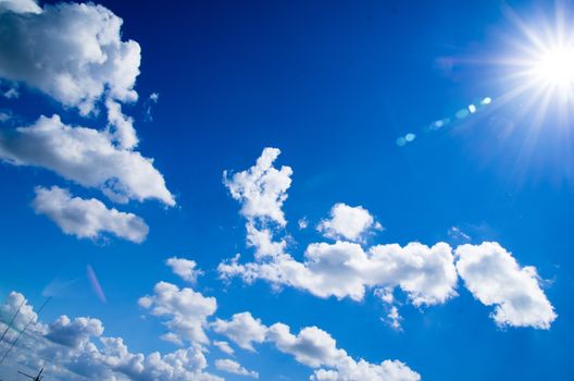 blue sky background with tiny clouds