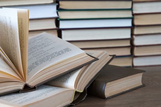 books on wooden deck tabletop