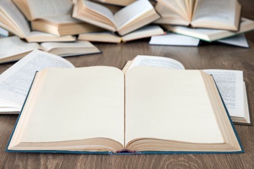 books on a wooden background