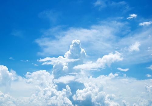 blue sky background with tiny clouds