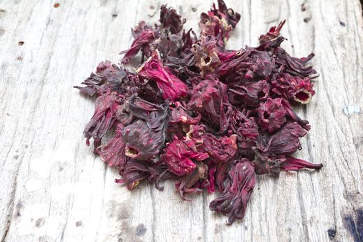 Dry Roselle on old wood background