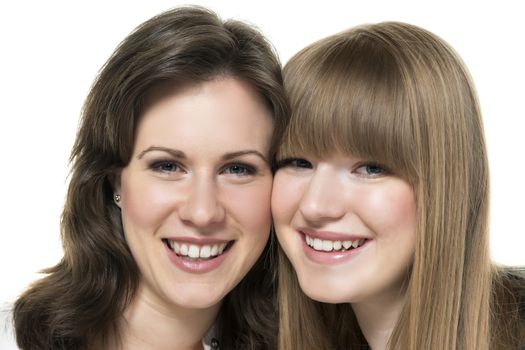 Portrait of two happy women, blond and brunette, isolated on white background