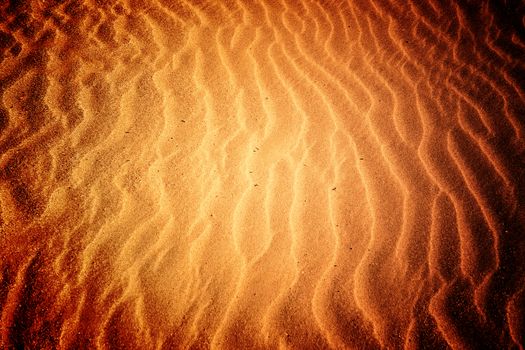 Beach with soft sand, rippled texture of windblown effect