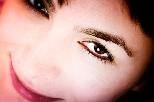 Closeup of beautiful young woman face.