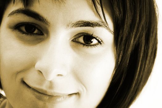 Closeup of beautiful young woman face.