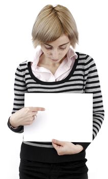 Young blonde woman holding a blank piece of paper.
