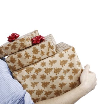 Young man holding a present in hands.