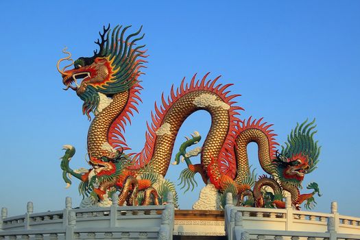 golden dragon on beautiful sky background