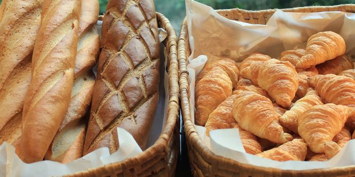 french baguette and croissant on buffet line