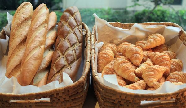 french baguette and croissant on buffet line