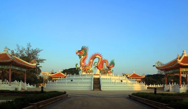 Chinese golden dragon on beautiful sky background
