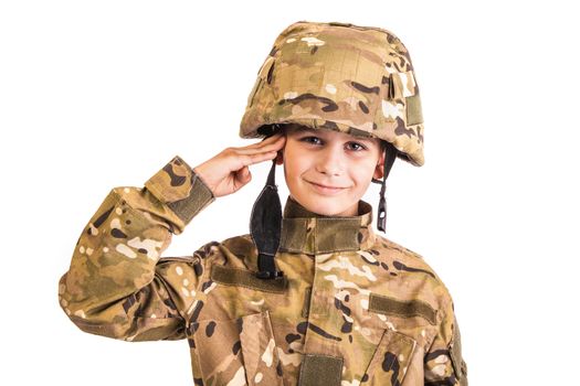 Saluting soldier. Young boy dressed like a soldier isolated on white